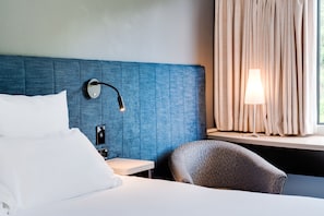 Hypo-allergenic bedding, down duvets, desk, blackout curtains