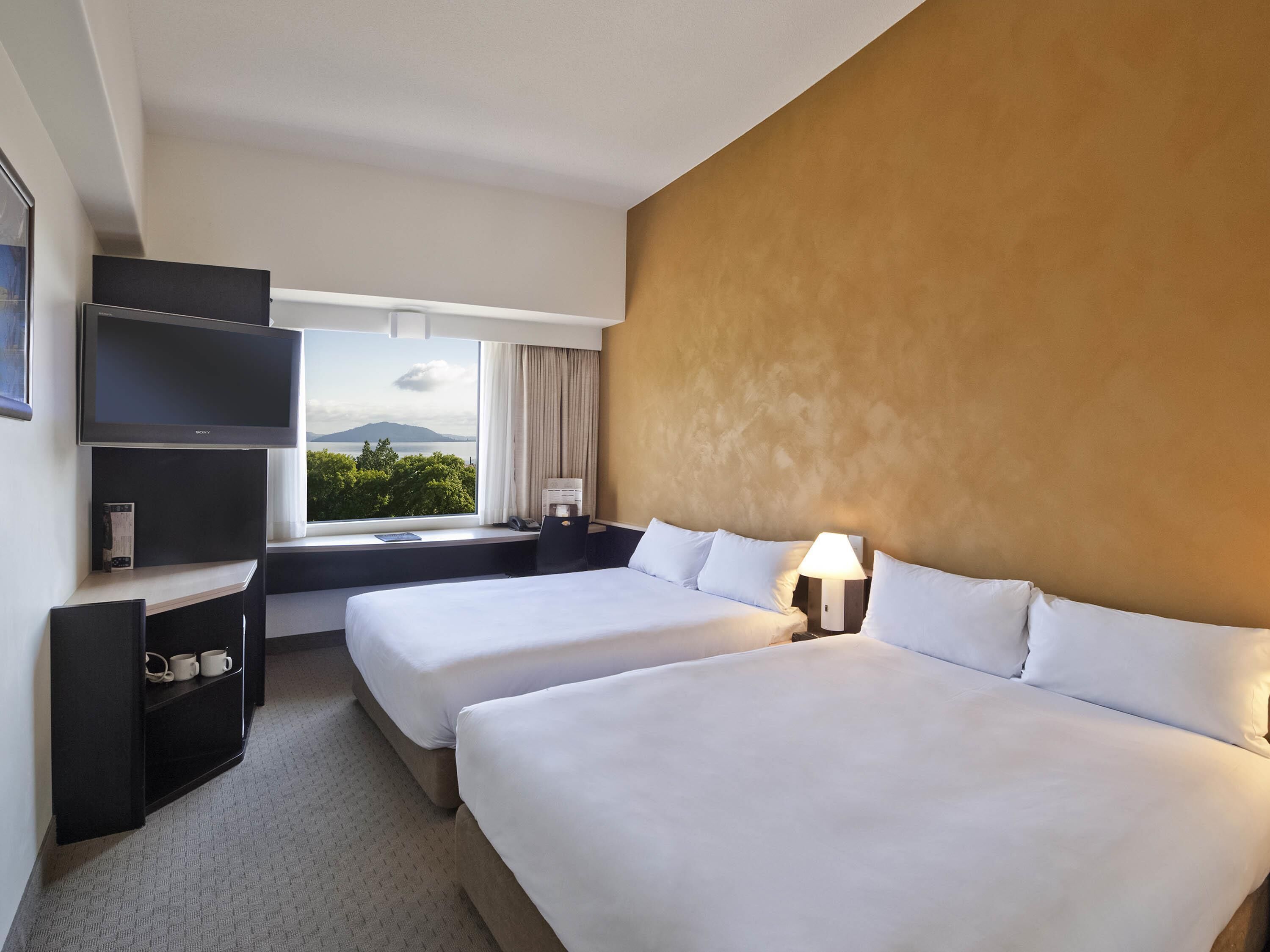 Twin Room, 2 Double Beds, City View | Hypo-allergenic bedding, down comforters, desk, blackout drapes