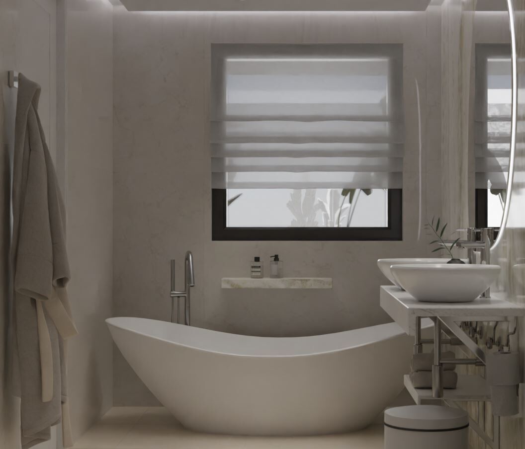 Ein modernes Badezimmer mit einer freistehenden Badewanne, einem Fenster über dem Waschbecken und einem Handtuchhalter.