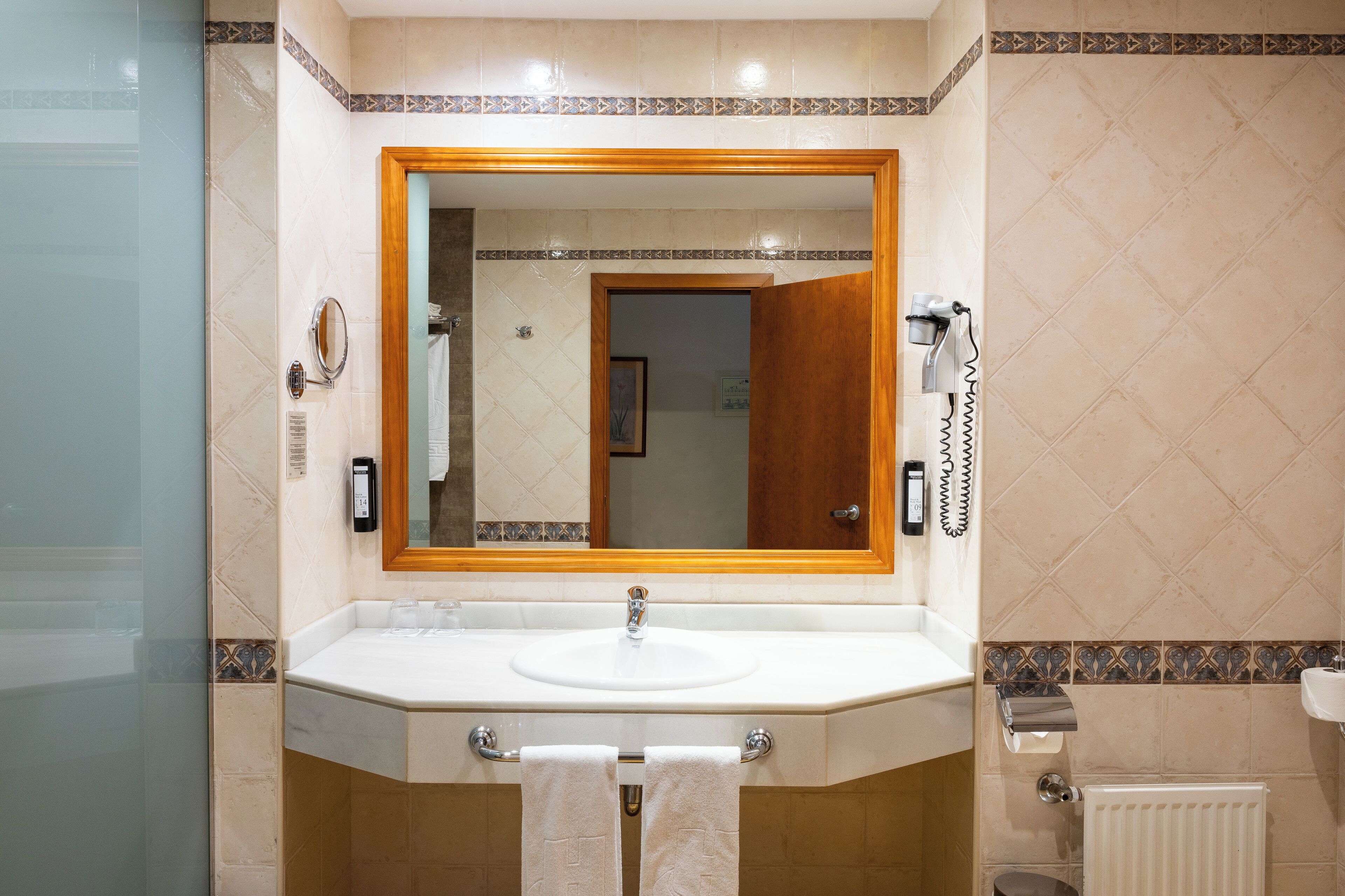 eco-friendly toiletries, hair dryer, bidet, towels