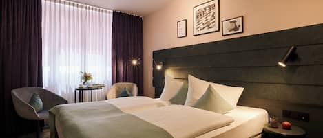 Minibar, caja de seguridad en la habitación y cortinas blackout