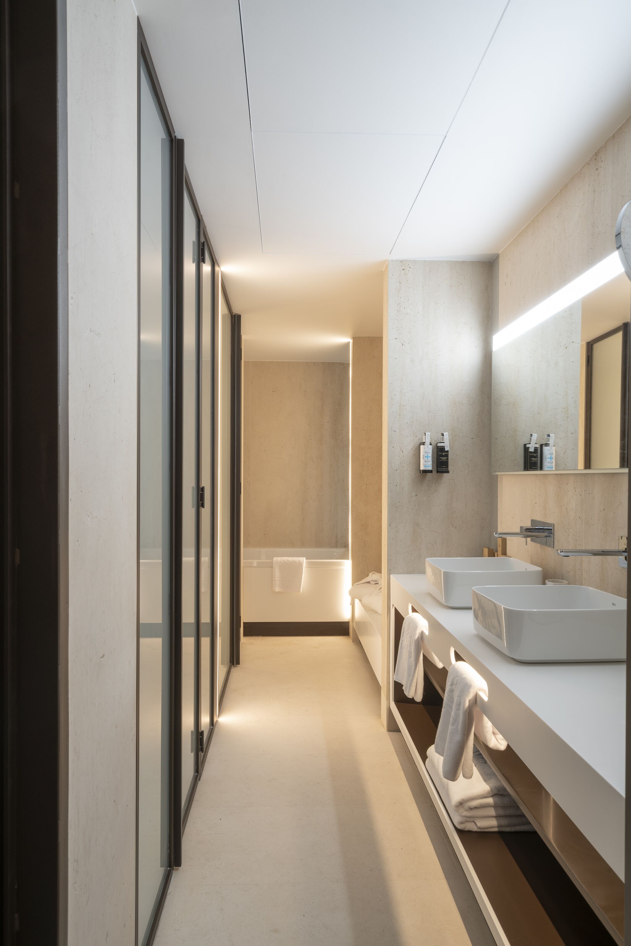 eco-friendly toiletries, hair dryer, slippers, heated floors