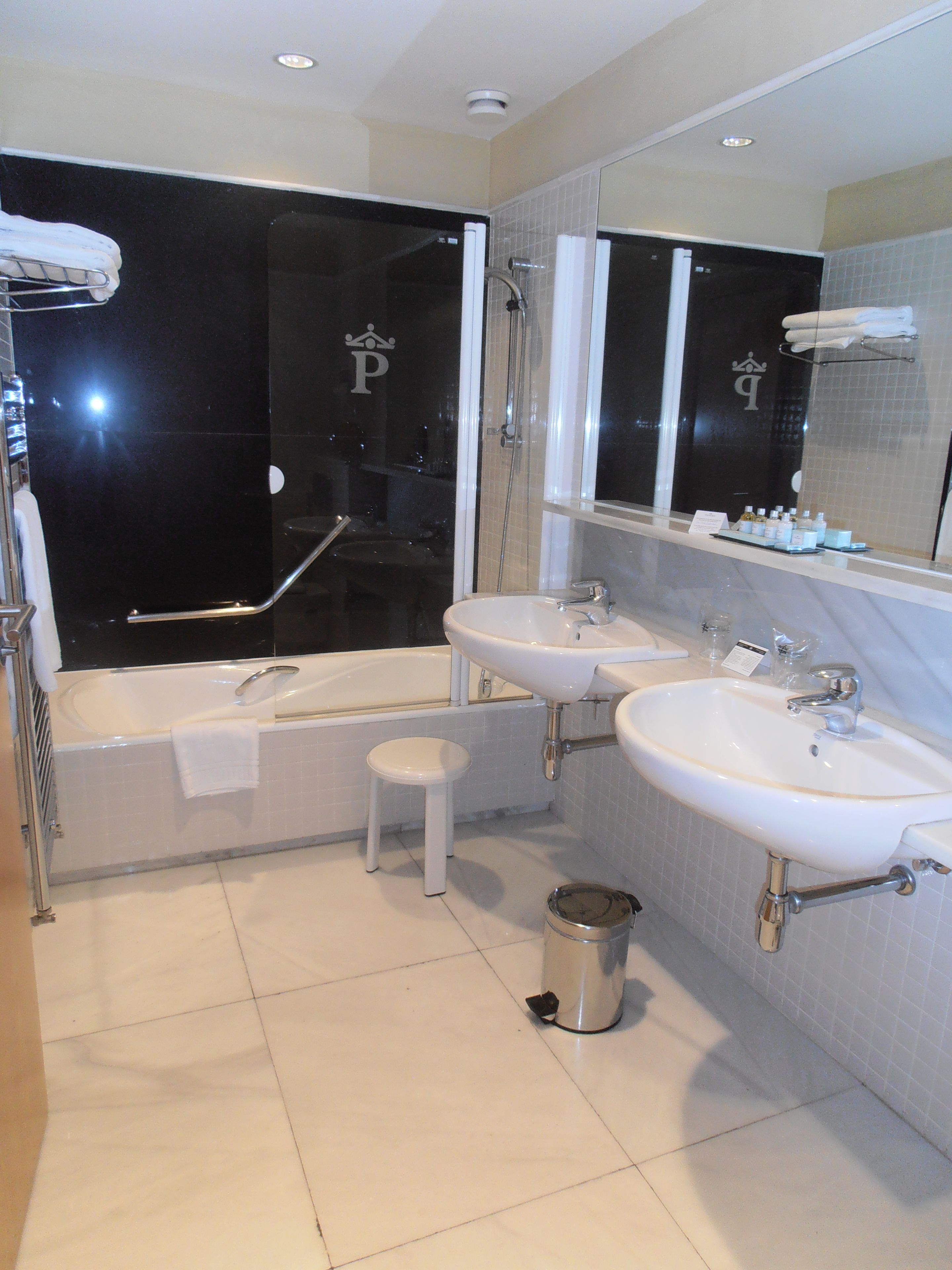 eco-friendly toiletries, hair dryer, towels