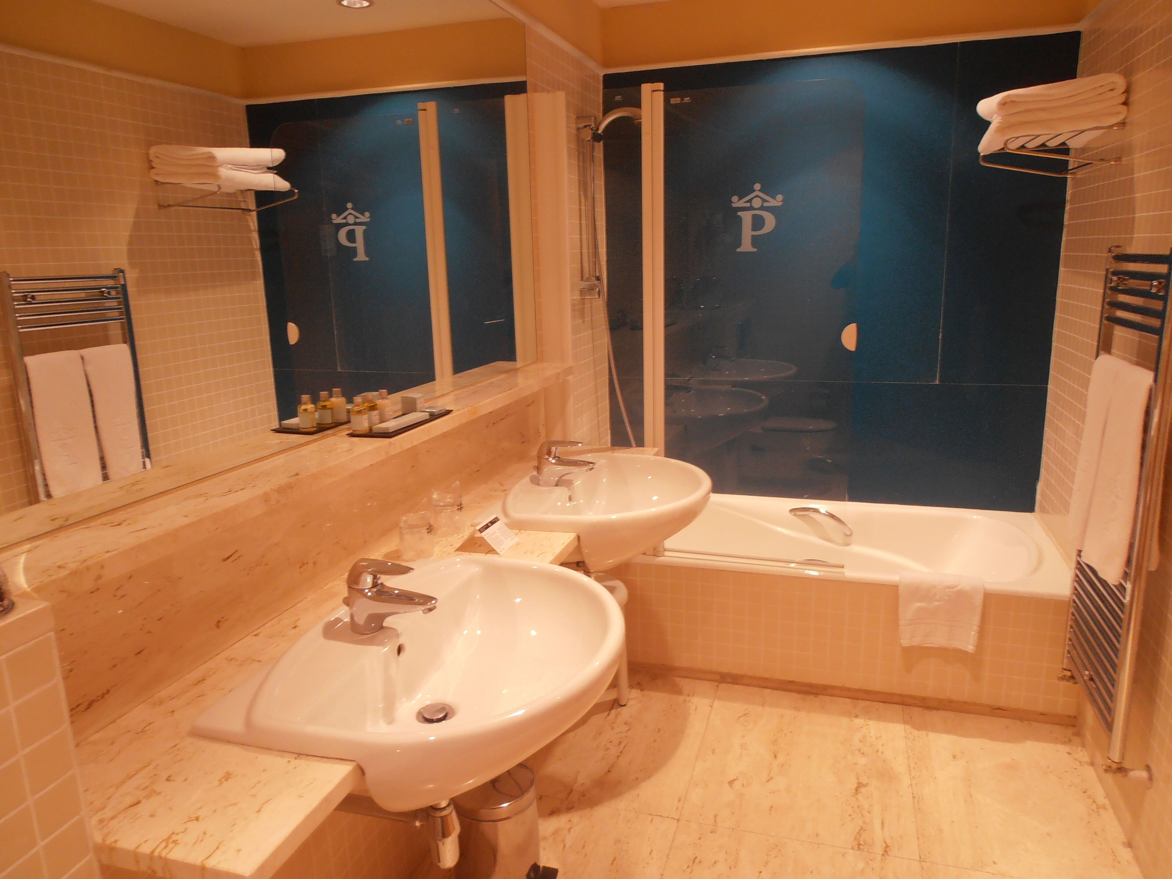 eco-friendly toiletries, hair dryer, towels