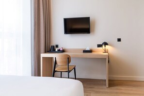 Classic Double or Twin Room | Desk, laptop workspace, blackout drapes, iron/ironing board