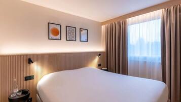 Desk, laptop workspace, blackout curtains, iron/ironing board