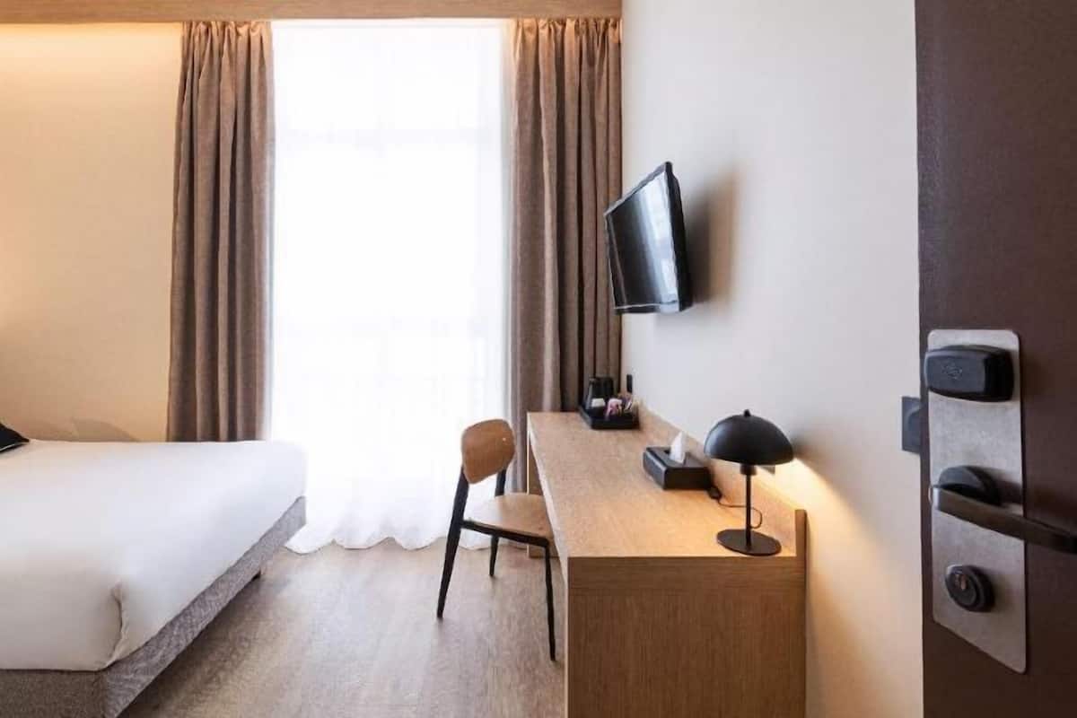 Desk, laptop workspace, blackout curtains, iron/ironing board