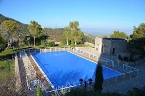 Seasonal outdoor pool, pool umbrellas, pool loungers