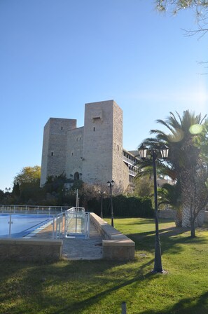 Seasonal outdoor pool, pool umbrellas, pool loungers