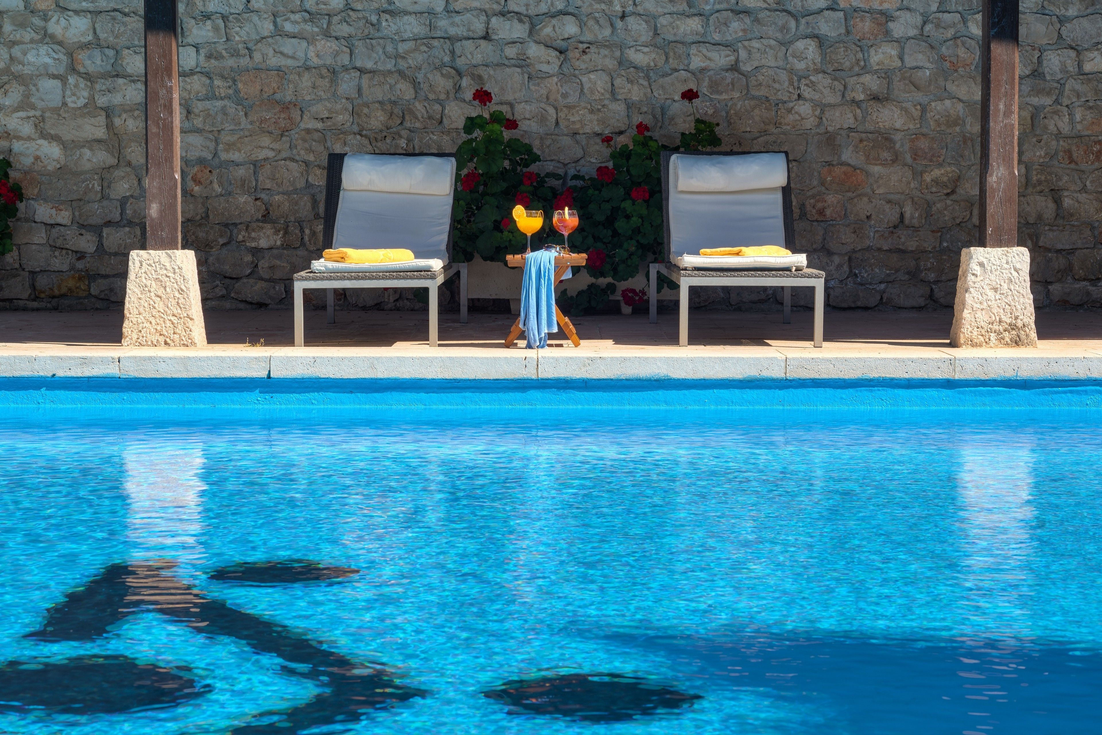 outdoor pool, pool loungers