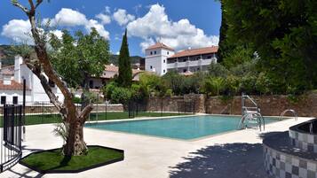 Seasonal outdoor pool, open 11:00 AM to 8:00 PM, sun loungers