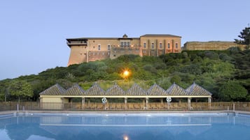 Seasonal outdoor pool, pool umbrellas, pool loungers