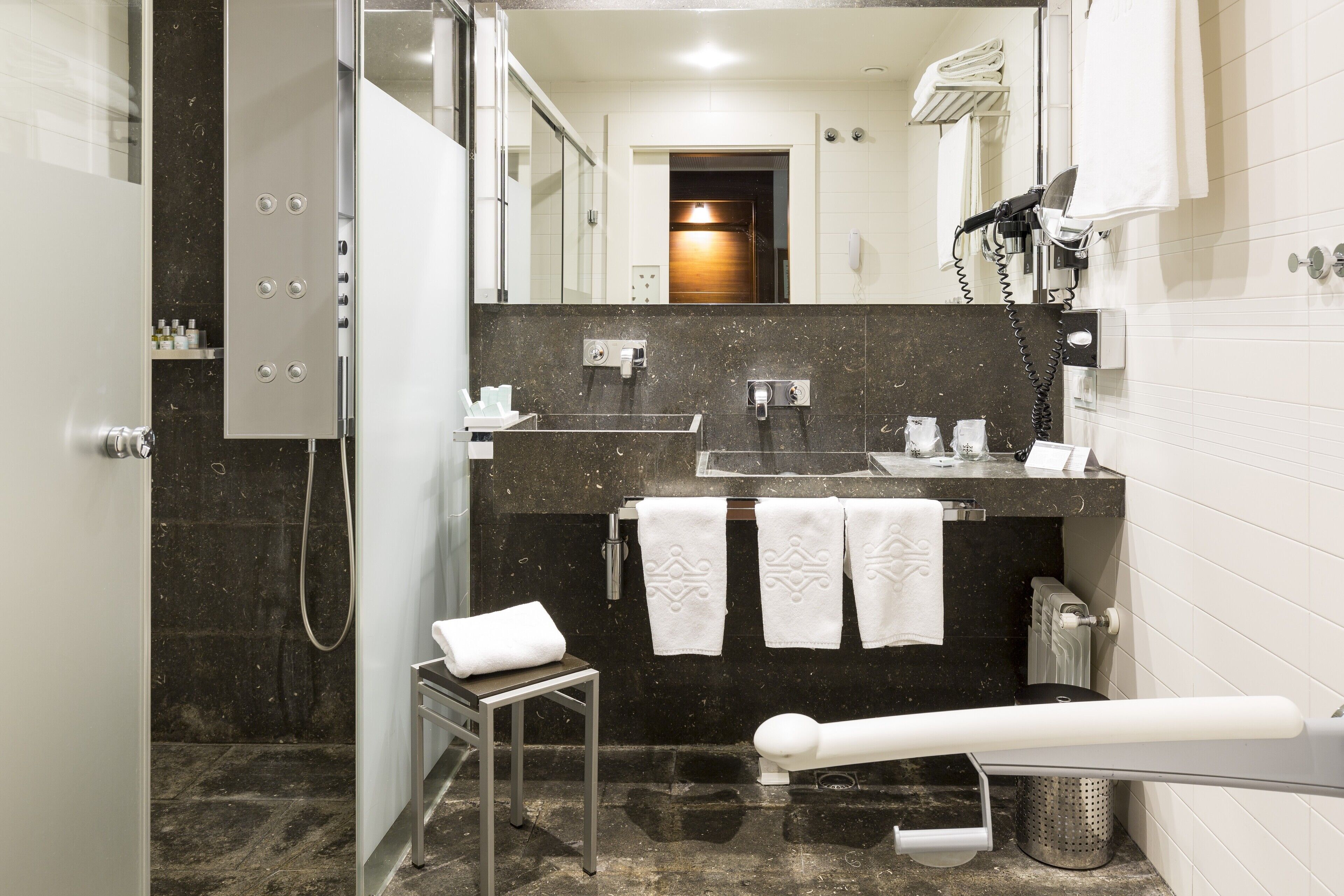 jetted bath, free toiletries, hair dryer, bathrobes