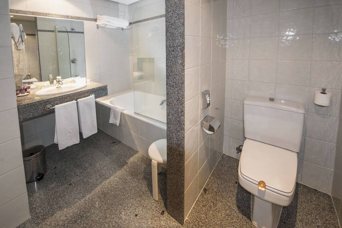 free toiletries, hair dryer, bidet, towels
