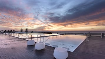 Seasonal outdoor pool, sun loungers