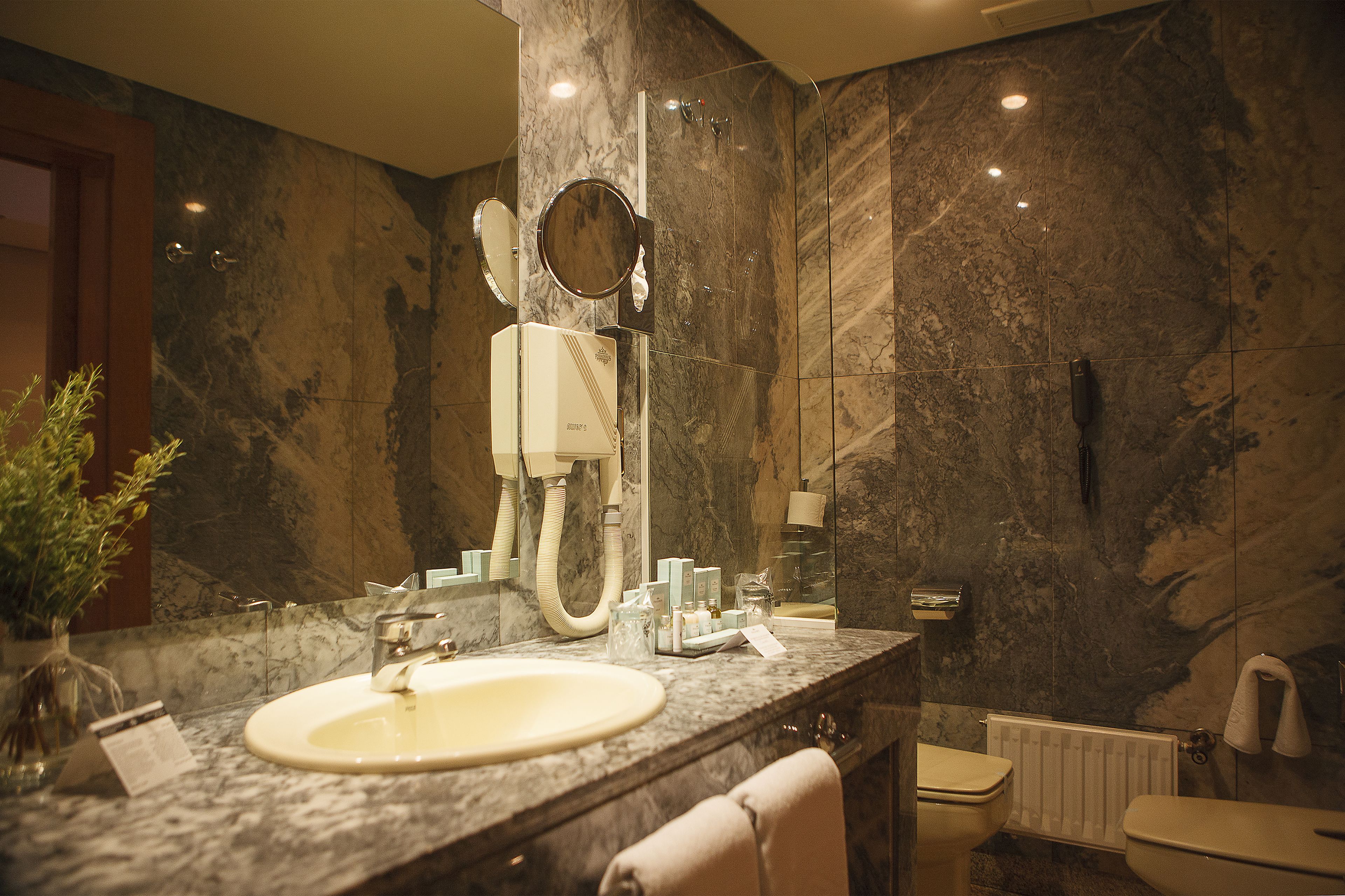 free toiletries, hair dryer, bidet, towels