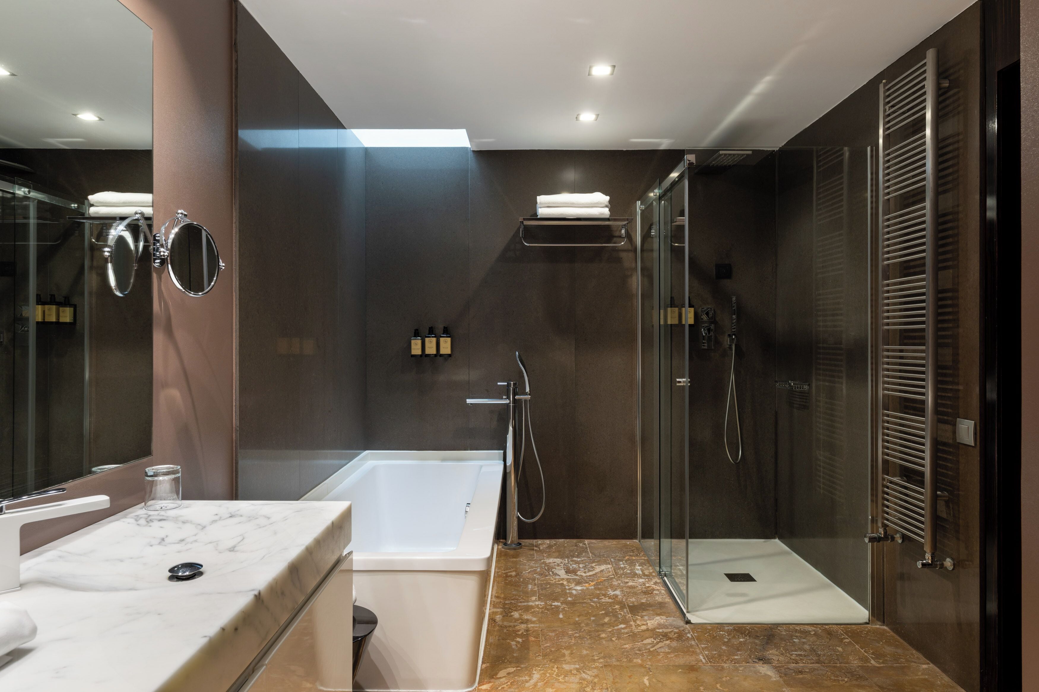 deep-soaking bathtub, eco-friendly toiletries, hair dryer, bidet