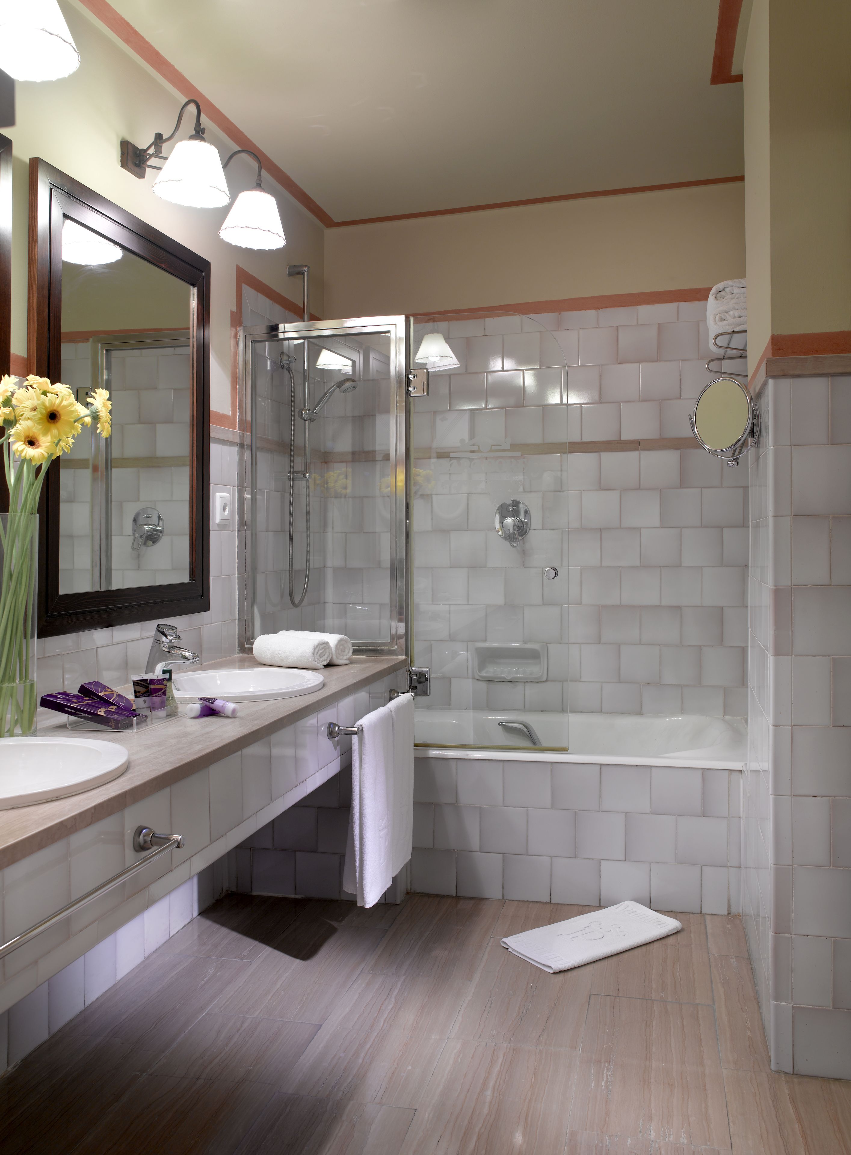 designer toiletries, hair dryer, bidet, towels