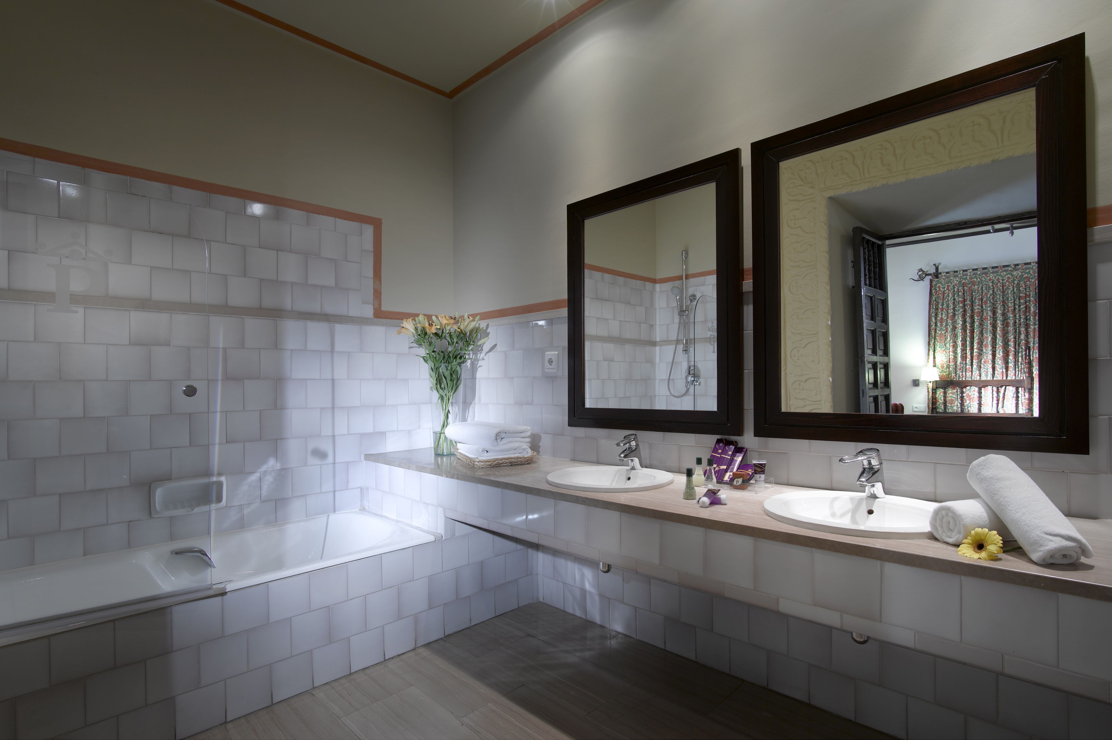 designer toiletries, hair dryer, bidet, towels