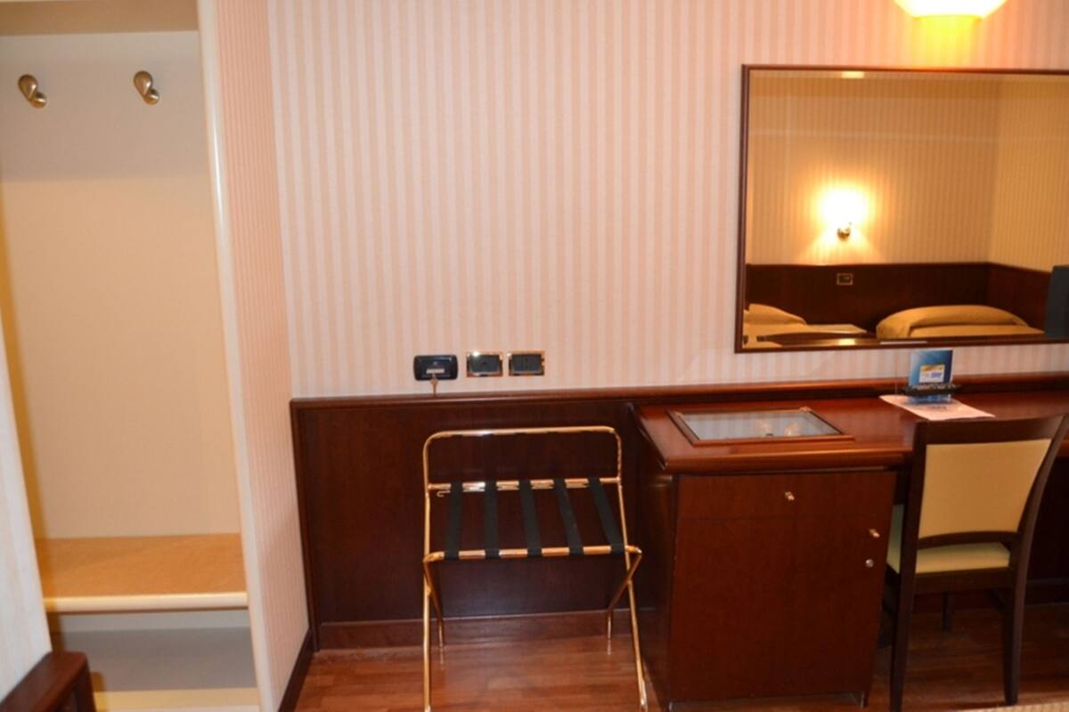Standard Triple Room | Minibar, in-room safe, desk, soundproofing