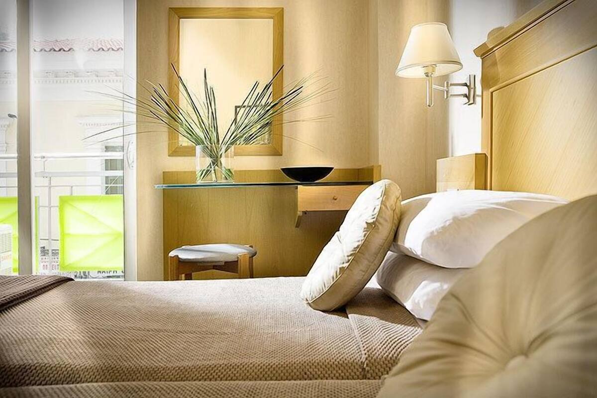 Single Room | Minibar, in-room safe, blackout drapes, iron/ironing board (on request)