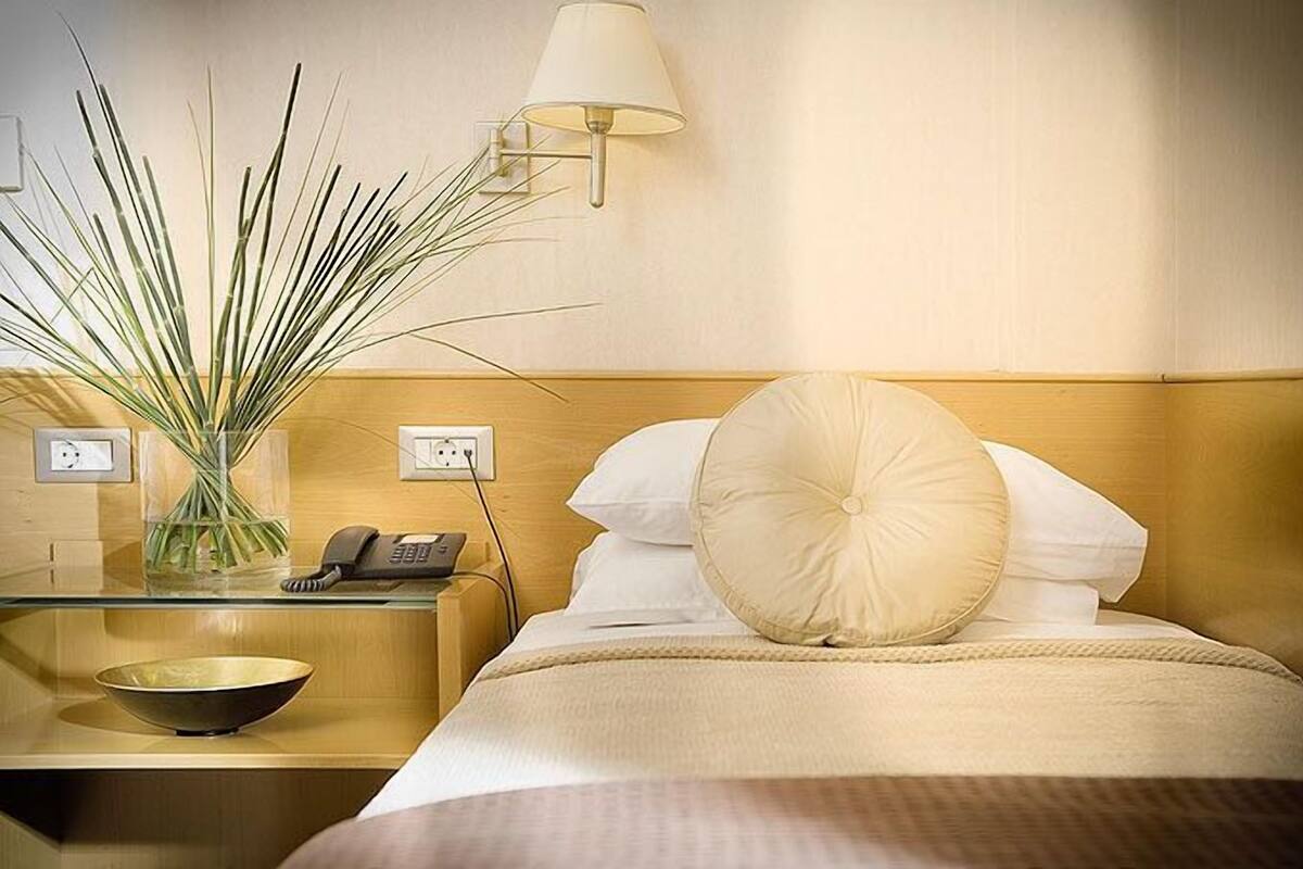 Standard Double or Twin Room | Minibar, in-room safe, blackout drapes, iron/ironing board (on request)
