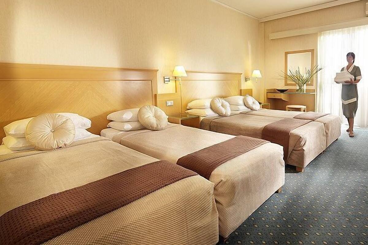 Quadruple Room | Minibar, in-room safe, blackout drapes, iron/ironing board (on request)
