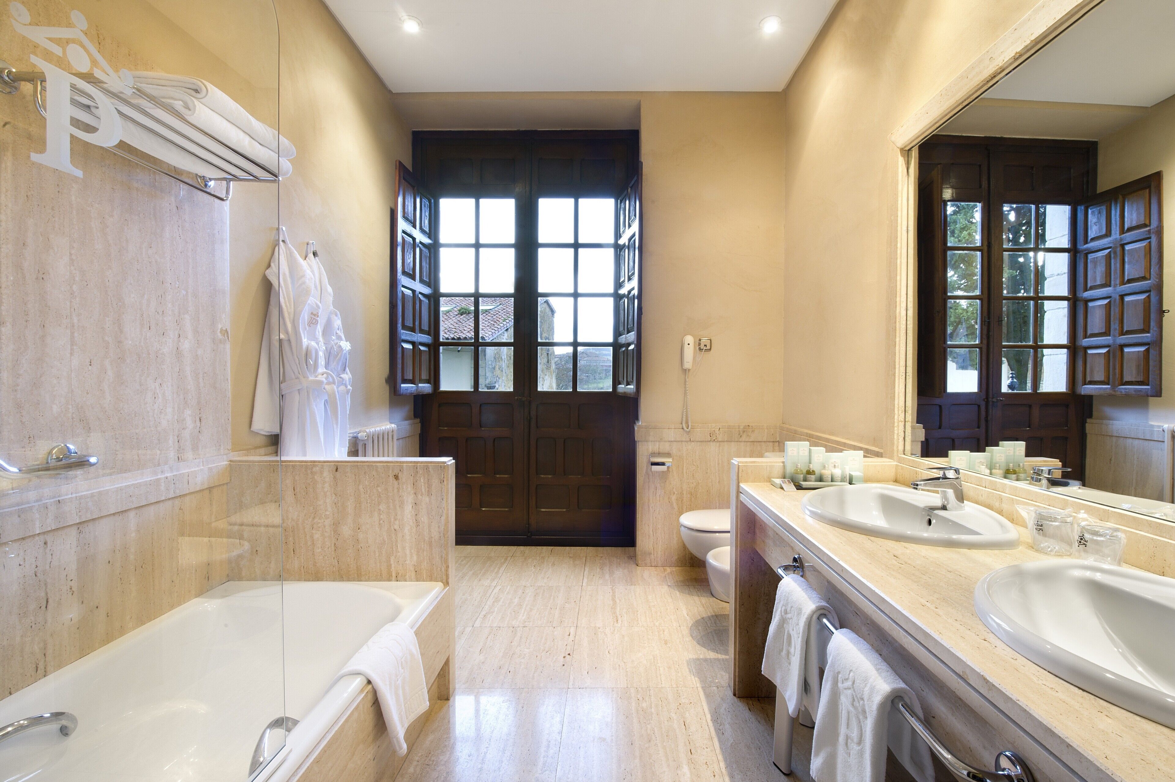 bathtub, free toiletries, hair dryer, towels