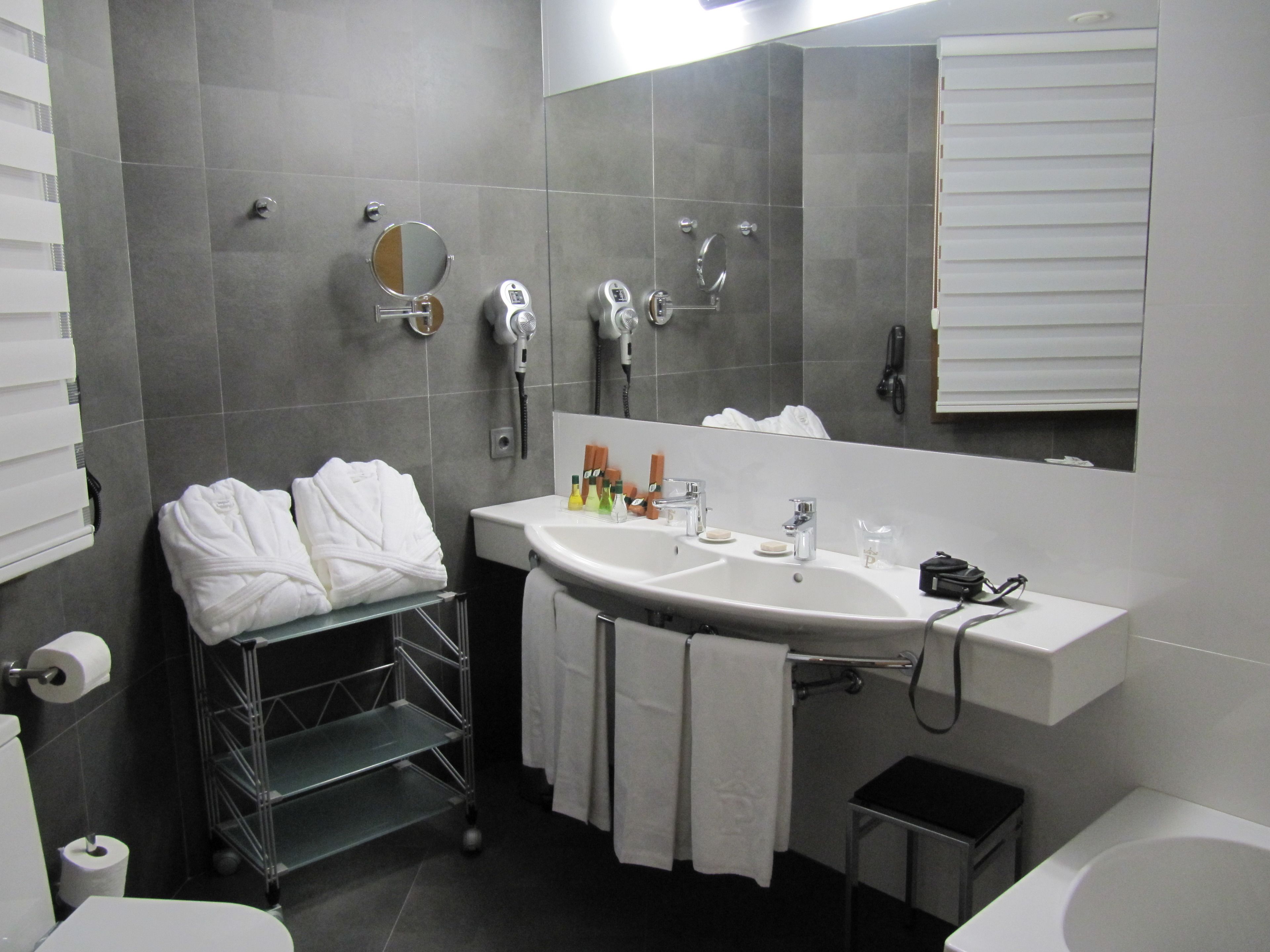 eco-friendly toiletries, hair dryer, bidet, towels