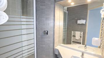 Shower, hair dryer, towels, soap