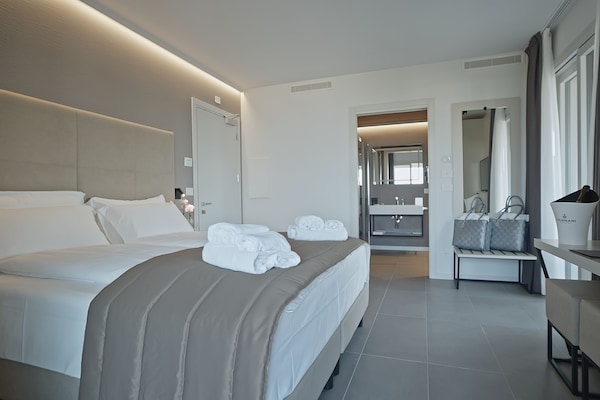 Luxury Room | Premium bedding, down comforters, in-room safe, desk