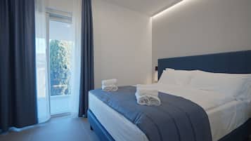 Habitación básica doble | Caja fuerte, escritorio, cortinas opacas y wifi gratis