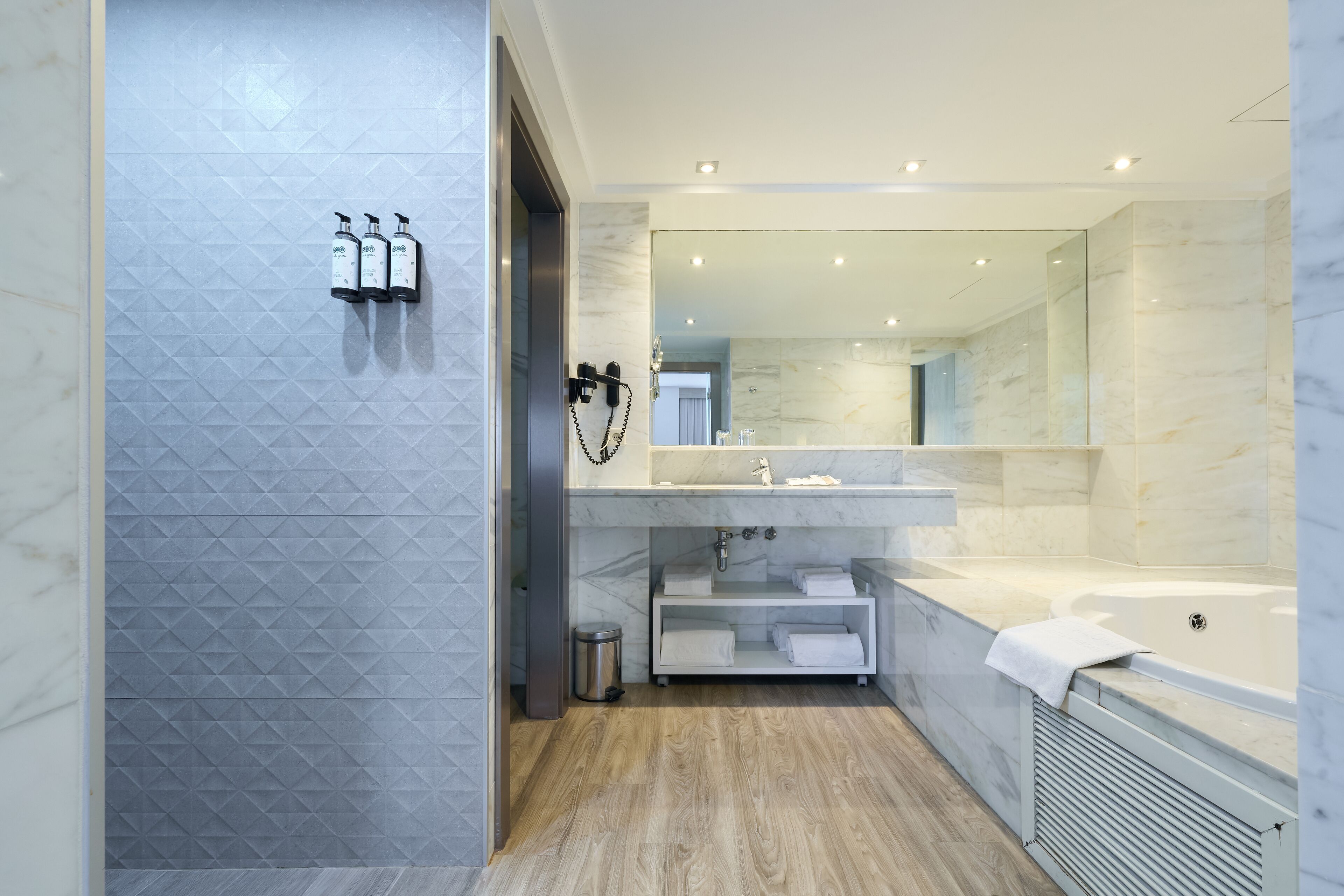 eco-friendly toiletries, hair dryer, towels