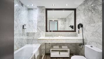 Eco-friendly toiletries, hair dryer, towels