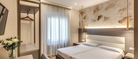 Superior Double Room | Minibar, in-room safe, desk, iron/ironing board