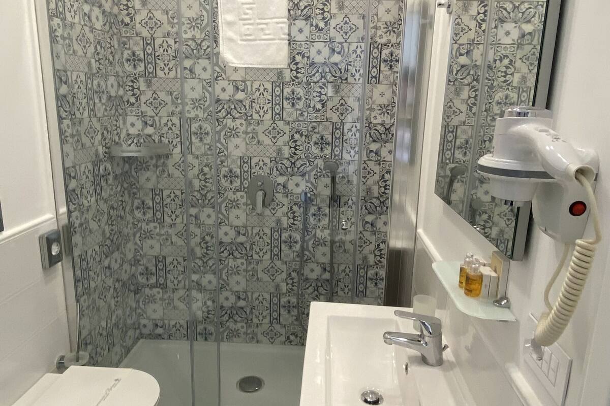 superior room, balcony | bathroom | deep-soaking bathtub, rainfall showerhead, designer toiletries