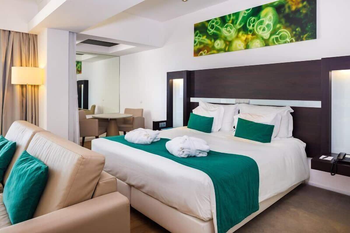 Junior Suite, Balcony, Sea View | Hypo-allergenic bedding available, minibar, in-room safe, desk