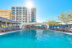 Indoor pool, outdoor pool, open 9:00 AM to 7:00 PM, pool umbrellas