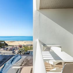 Superior Double or Twin Room, Partial Sea View | 1 bedroom, minibar, in-room safe, desk