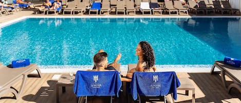 Indoor pool, outdoor pool, open 9:00 AM to 7:00 PM, pool umbrellas