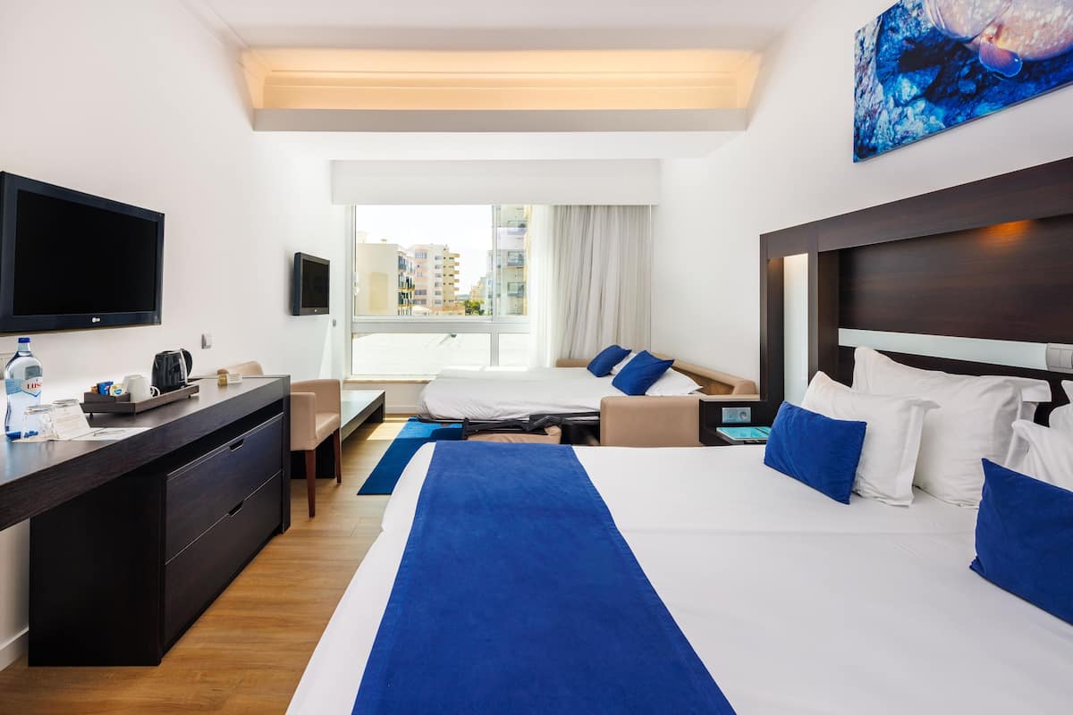 Family Room (Standard) | Minibar, in-room safe, desk, laptop workspace