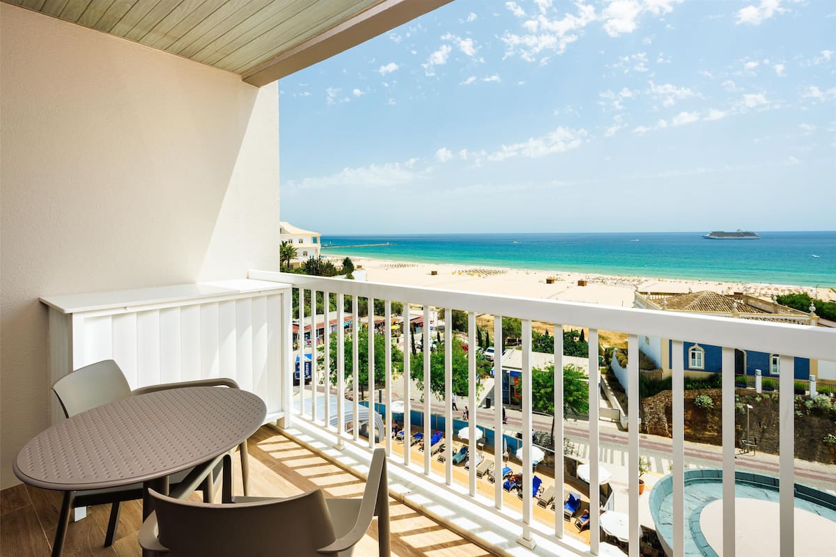 Junior Suite, Sea View | 1 bedroom, minibar, in-room safe, desk