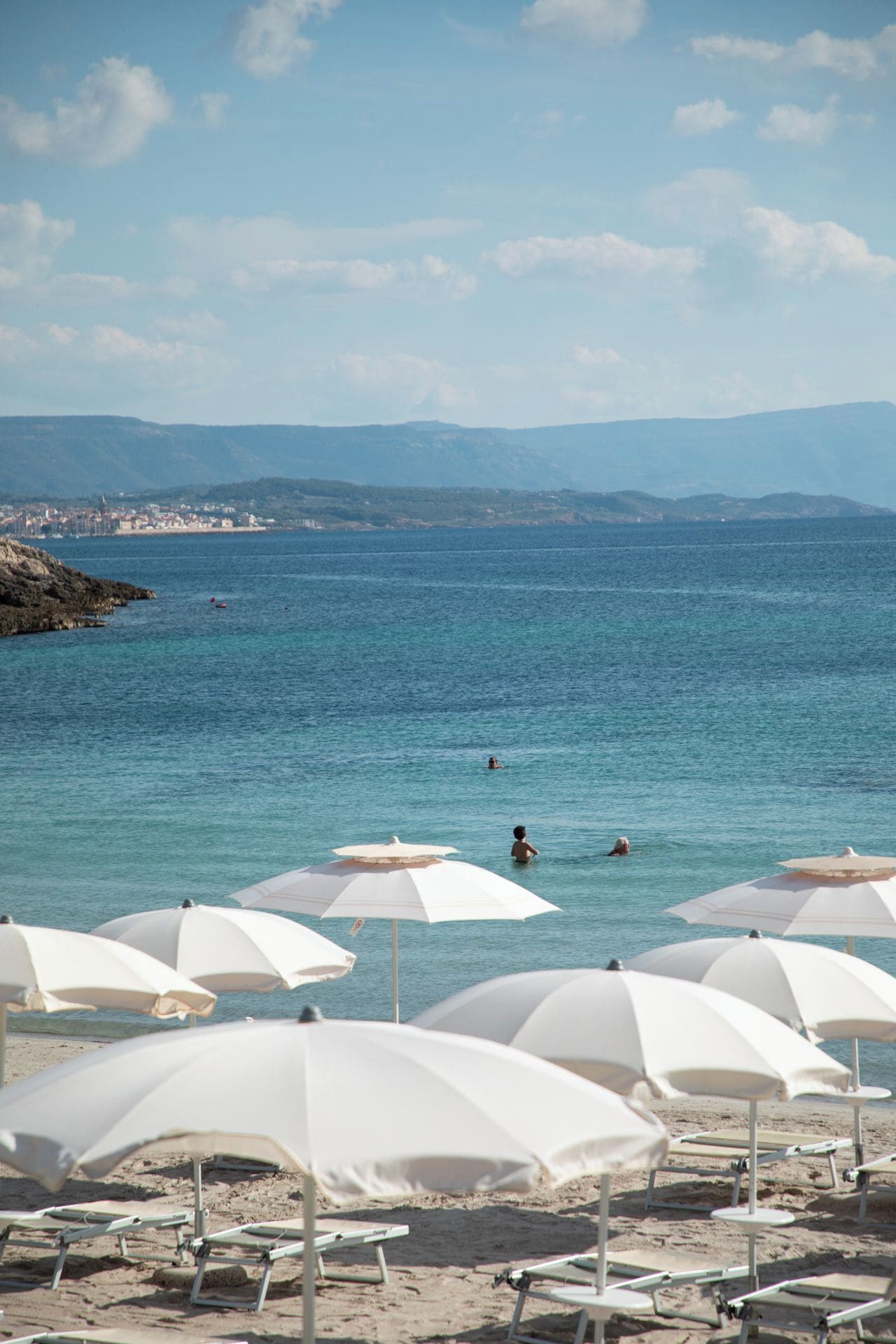 Private beach, white sand, sun-loungers, beach umbrellas