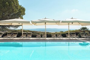 2 outdoor pools, pool umbrellas, pool loungers