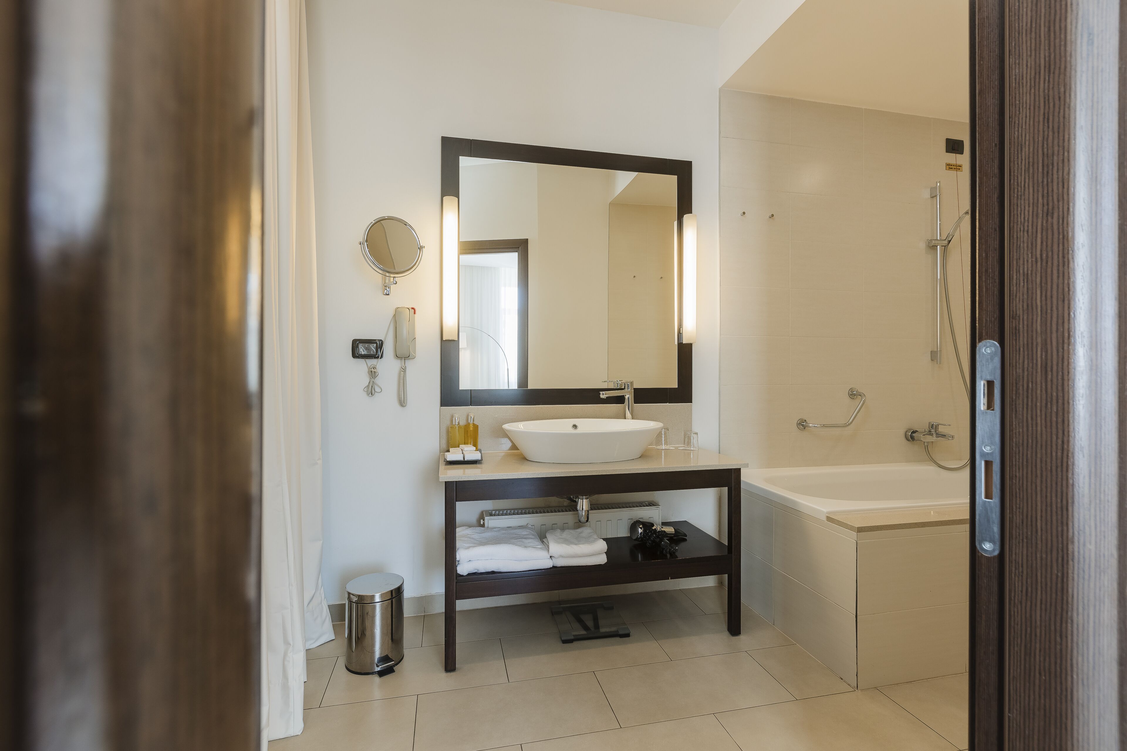 deep-soaking bathtub, hair dryer, bathrobes, slippers