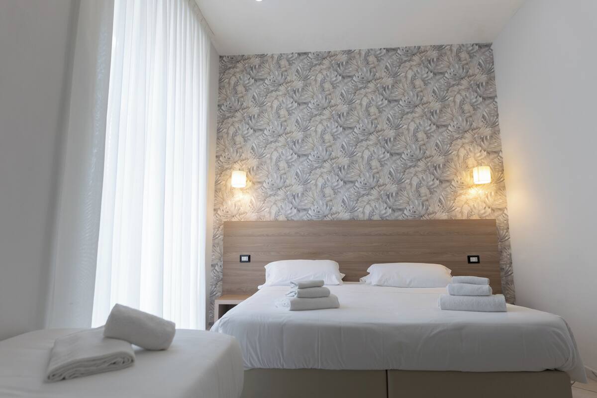 Premium bedding, down comforters, minibar, in-room safe