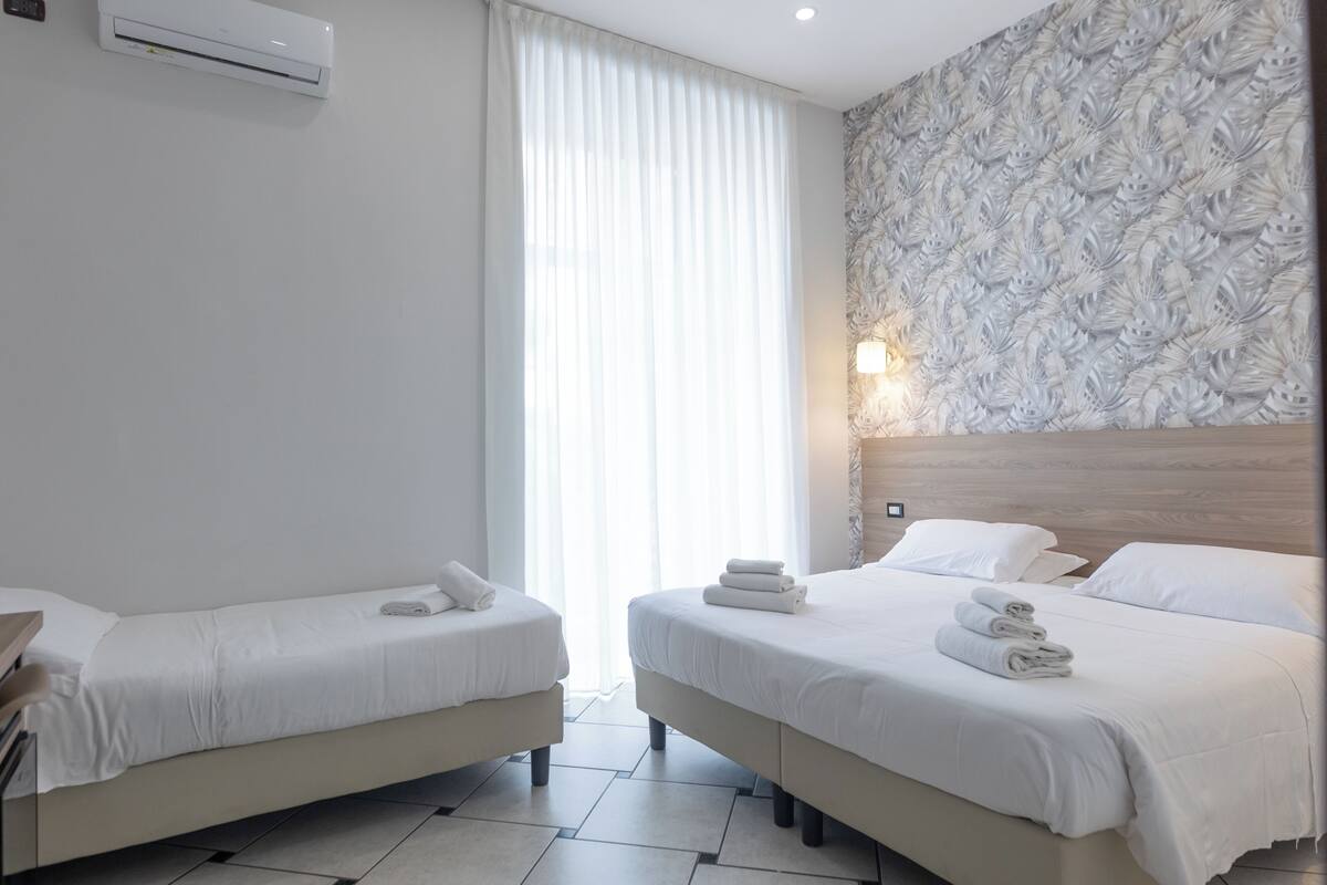 Premium bedding, down comforters, minibar, in-room safe