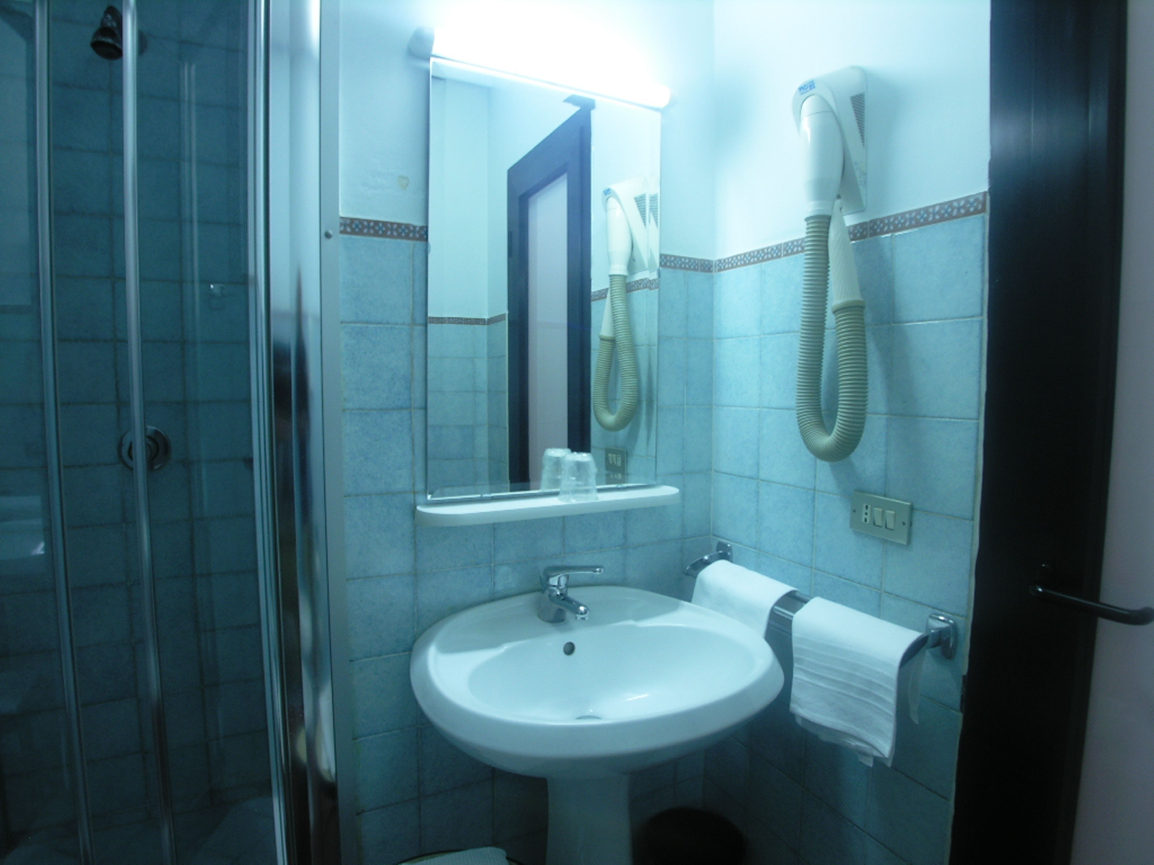 shower, free toiletries, hair dryer, slippers