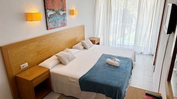 Triple Room, Balcony (Free Beach Shuttle) | Desk, blackout drapes, free WiFi, bed sheets