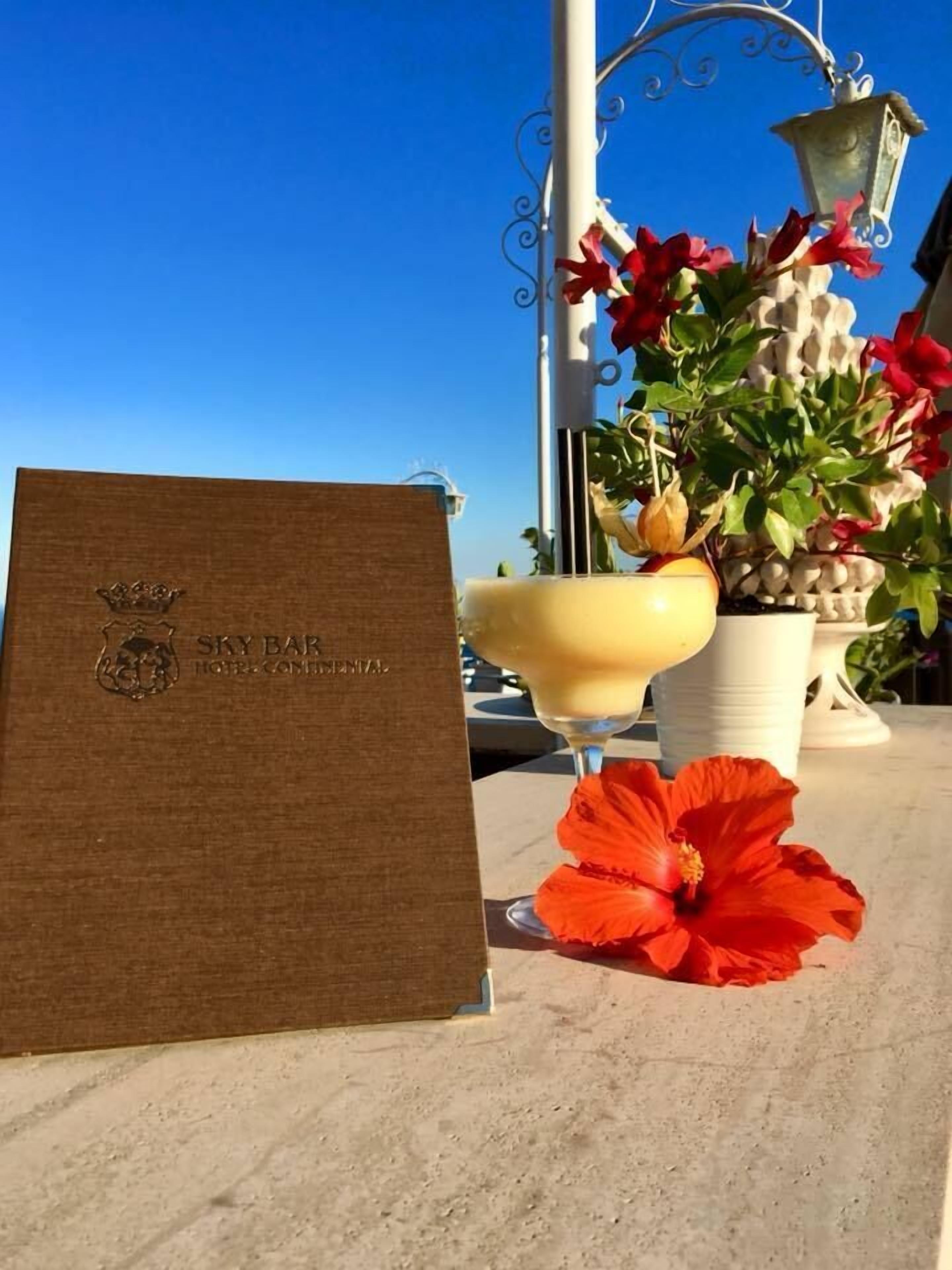 deluxe double or twin room, 1 double or 2 single beds, balcony, partial sea view | terrace/patio